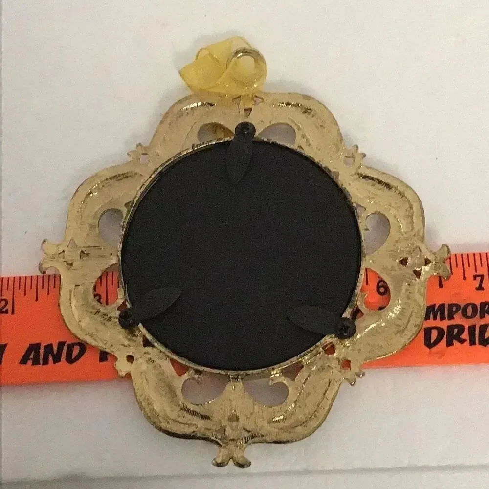 Beautiful vintage 4 1/2 inch Mary and the baby Jesus medallion ornament